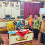 PJ.Sekda Ir.Suaidi,MM., Launching dan Penandatangan Perjanjian Kerjasama Inovasi Penerbitan Akte Perkawinan Melalui, Kolaborasi dengan Tokoh Agama(KOTA)